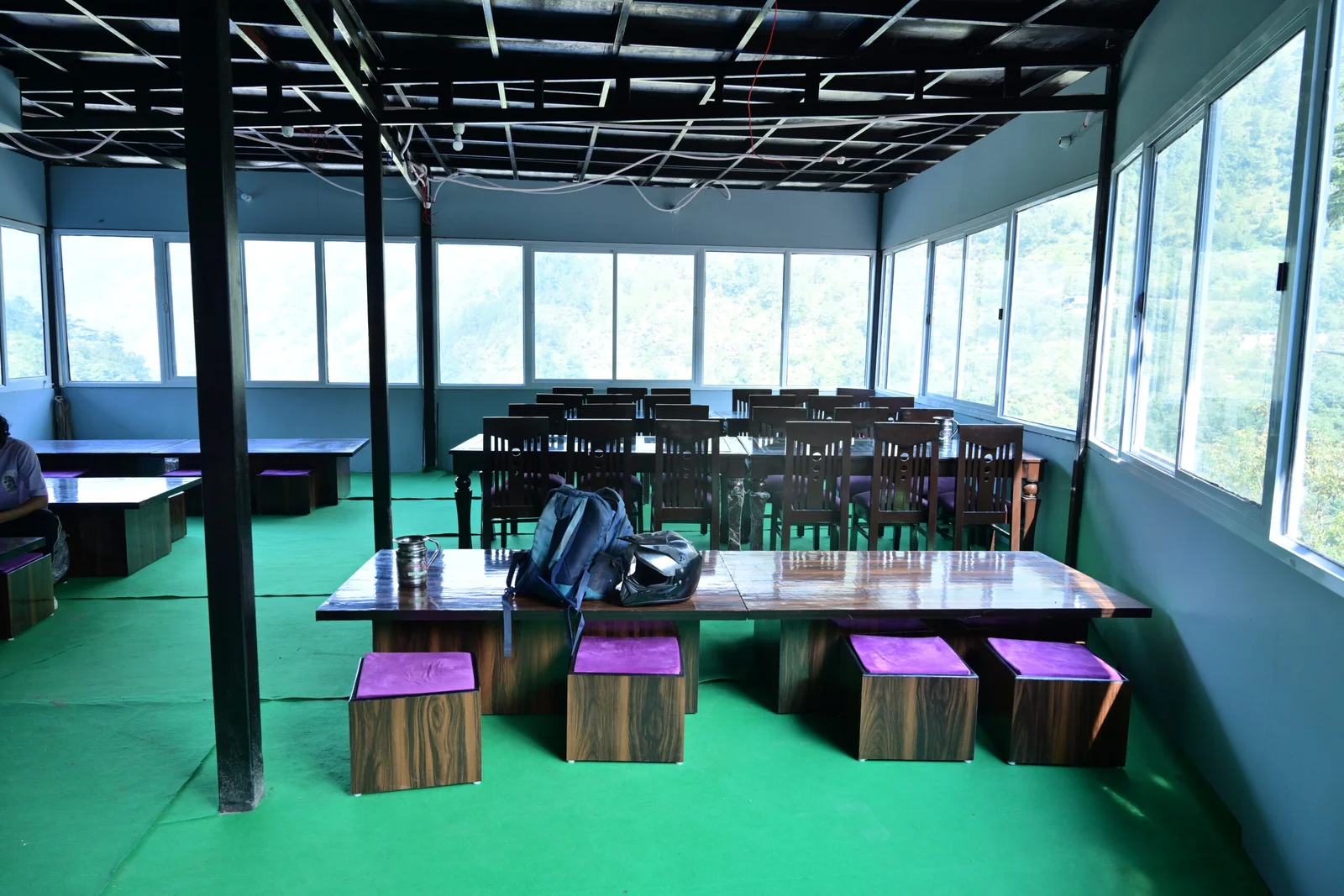 Dining and seating area with valley views