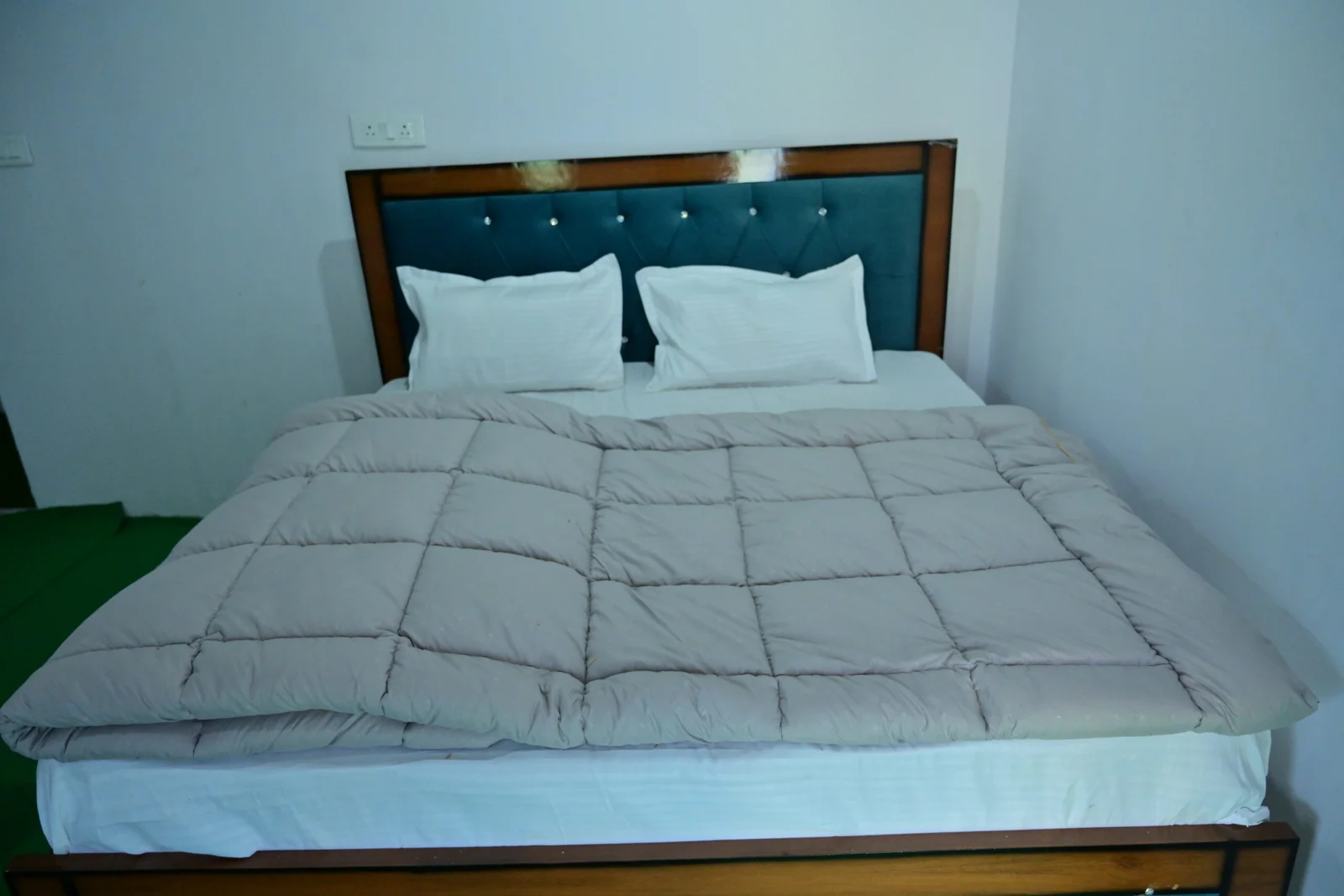 Cottage room with comfortable bedding